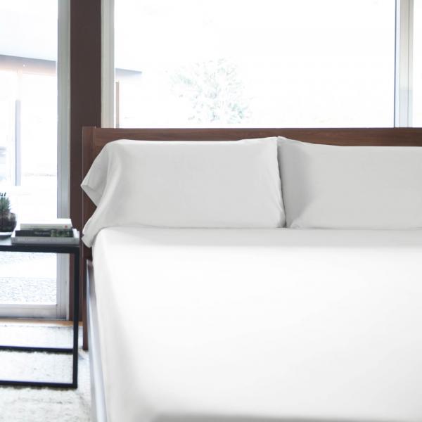 Shot of White Bamboo Pillowcases on white bed