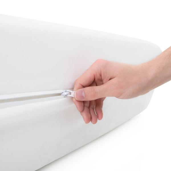 Hand unzipping Malouf Encase® Box Spring Protector at Real Deal Sleep